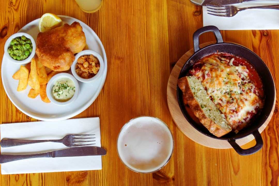 Light lunch dishes: fish and chips and lasagne